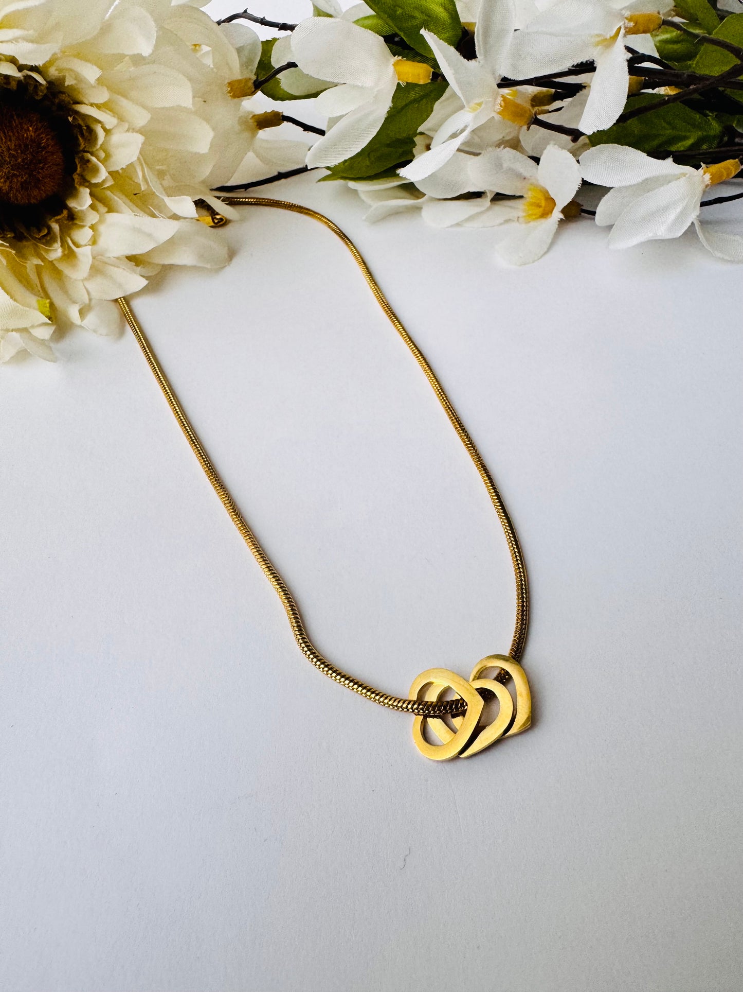 Row of hearts pendant